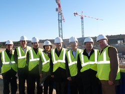 Posing in front of the ITER Tokamak Pit: Delegation members (from left) Lim Nam Jin (ITER), Lee Jae Yoon, Yang Jong Oh, Sim Yeon Mi, Kim Beommo and Gim In—Ho who were accompanied by the head of the ITER Korean Domestic Agency, Kijung Jung and head of ITER Communication Michel Claessens. (Click to view larger version...)