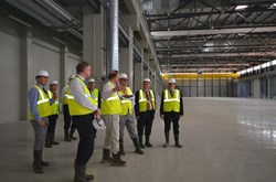 So far, only a few people have seen it from the inside. The Swedish delegation visits the Poloidal Field Coils Winding Facility. (Click to view larger version...)