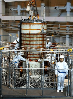 The insert coil is lowered into the test facility at Naka, Japan. Photo: JAEA (Click to view larger version...)