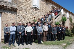 A smile for fusion history: the group posing in front of the Chateau de Cadarache. (Click to view larger version...)