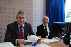 Werner Burkart, IAEA Deputy Director-General, and Ralf Kaiser, Head of the Agency's Physics Section, observing the proceedings at the seventh ITER Council meeting. (Click to view larger version...)