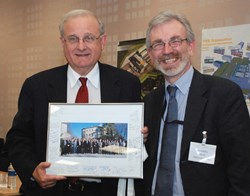 After seven years acting as Chairman of the ITPA, Ron Stambaugh from the US stepped down. On behalf of the panel's members, David Campbell from the ITER Directorate for Plasma Operations handed him a photo of the ''family.'' (Click to view larger version...)