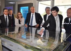 Ken Blackler, Head of the Assembly & Operation Division, presents the model of the installation to the Préfet. Looking on are, from left to right: Michel Bedoucha, CEA-Cadarache Deputy-Director; Jérôme Paméla, director of AIF; Yvette Mathieu, Préfète of Alpes-de-Haute-Provence; Préfet Parant; DG Motojima and General Mondoulet. (Click to view larger version...)