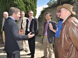 Charles H. Rivkin, US Ambassador to France, met with the ITER ''American Community'' and guests on the Château terrace. From left to right: Cesar Luongo; the Ambassador; Joe Minervini from MIT; Joe Snipes; Chang Jun Hoon; Ed Daly; and, wearing a hat, Bob Simmons visiting from the Princeton Plasma Physics Laboratory. (Click to view larger version...)