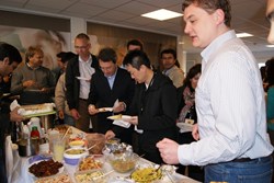 Hot curry and chai instead of coffee and croissant: guests at the 4th intercultural breakfast this week. (Click to view larger version...)