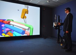 CEA/IRFM has added a capability to connect a physical robotic arm to the virtual objects that appear on the screen. (Click to view larger version...)
