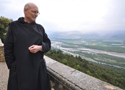 Standing at the edge of the ''island in the sky'', Dom Michel Pascal, the Abbot emeritus of the monastery of Ganagobie. (Click to view larger version...)