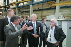 ITER Director-General Osamu Motojima (with Alessandro Bonito-Oliva to his right) inspecting the prototype at CNIM in Toulon. (Click to view larger version...)