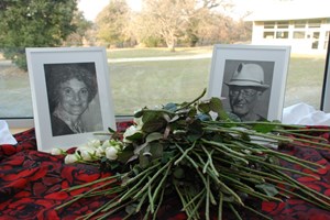 White roses were placed in front of the Tanga's photos. (Click to view larger version...)
