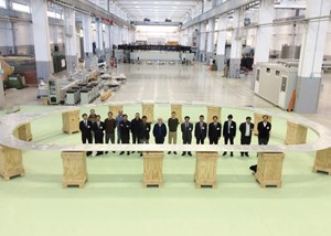 Representatives of the European and Japanese Domestic Agencies, Japanese manufacturers Toshiba and Mitsubishi, and the ASG consortium (ASG, Iberdrola and Elytt) pose inside of the completed, and successfully tested, prototype. (Click to view larger version...)