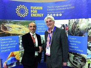 Carlo Damiani, European Domestic Agency project manager for ITER remote handling systems shakes hands with Ian Grayson, Operations Director at AMEC Foster Wheeler. (Click to view larger version...)