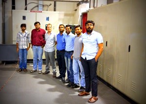 The team in front of the power cubicles at the dedicated lab in Gandhinagar: Dishang Upadhyay, Rasesh Dave, Thibault Gassmann, Amit Patel, Hitesh Dhola, Niranjan Goswami and Kush Mehta. (Click to view larger version...)