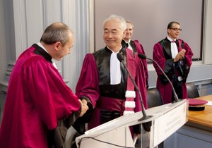 Director-General Motojima had donned the purple toga of professors, to which university Vice-President Denis Bertin attached the traditional ''ermine sash''. Professors André Thévand and Sadruddin Benkadda are in the background. (Click to view larger version...)