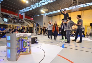 Victory is sweet: the high school team from Lycée Thiers in Marseille savours the reliable performance of its robot, baptized Bip-Bip. (Click to view larger version...)