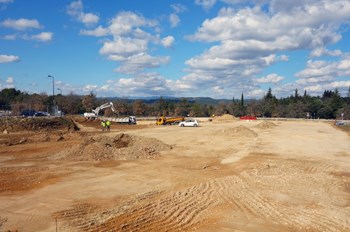 The vacant plot of land between the entrance road and the visitors' parking lot is being transformed into a 6,000-square-metre storage area for ITER components before they are assembled in the machine. (Click to view larger version...)