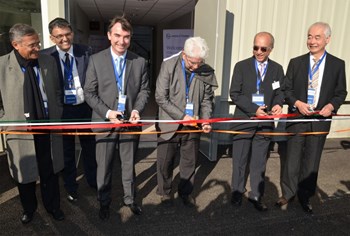 The symbolic ribbon at the entrance of the Cryostat Workshop was cut by Benoît Moncade, director-general of Spie-Batignolles; Pr. Predhiman Krishan Kaw, Indian delegate to the ITER Council; M.V. Kotwal, president of Larsen & Toubro's Heavy Engineering Division; and Osamu Motojima, Director-General of the ITER Organization. Looking on are Dhiraj Bora, director of the Indian Institute of Plasma Research and former ITER DDG and Ganesh Iyer, head of the ITER Project at Larsen & Toubro Ltd. (Click to view larger version...)