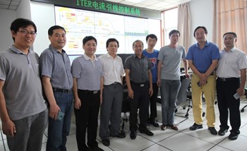 Assembled in the test hall control room at ASIPP (from left to right): ASIPP's Feng Hansheng, Chen Junling, Song Yuntao and Wan Baonian; the head of the Chinese Domestic Agency (CNDA), Luo Delong; ASIPP's Ding Kaizhong (test leader), Zhou Tingzhi (lead manufacturing responsible officer), Li Jiangang; and CNDA's He Kaihui. In the back, the MIMIC screen of the test control system supplied by the ITER Organization. (Click to view larger version...)