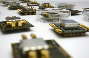 A sample of the electronic chips stemming from the collaboration between the European Domestic Agency, Oxford Technologies, and the Katholieke Universiteit of Leuven (KU Leuven). (Click to view larger version...)