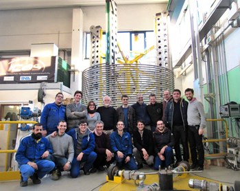 Representatives of the ICAS consortium and the European Domestic Agency celebrate an important milestone for ITER magnets—Europe's successful completion of 20 km of toroidal field conductor. (Click to view larger version...)