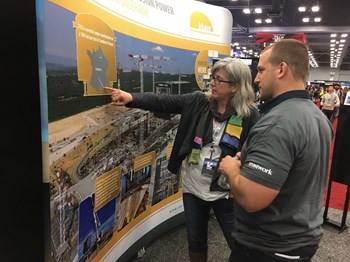 The ''international effort to build a Sun on Earth'' held its own among the high-tech stands of South by Southwest. Pictured is Lynne Degitz from US ITER. (Click to view larger version...)