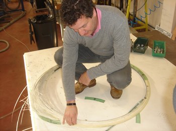 At the Italian laboratory ENEA, Juan assesses the failure mode of one of the ten mock-up rings tested to rupture. (Click to view larger version...)