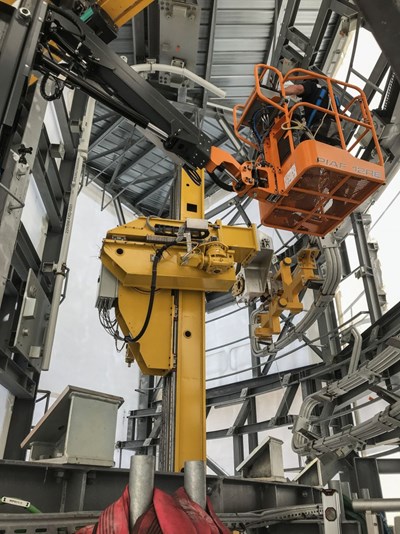 Two remote-controlled manipulators (in yellow) will help the assembly teams inside of the closed ITER vacuum vessel to install component systems directly on the inner walls. During testing, the manipulator showed it could position a 4.5-tonne blanket shield block with an accuracy of 0.1 millimetres. (Click to view larger version...)