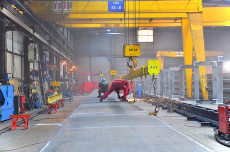 In addition to the main system that will lift loads of up to 1,500 tonnes, REEL will also deliver an auxiliary 50-tonne overhead crane, which is currently in the fabrication stage. (Click to view larger version...)