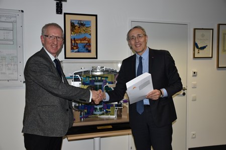 Michael Loughlin (left) was recognized by the ITER Director-General Bernard Bigot in early January for an innovation that not only adds value to ITER, but also attracts the interest of outside firms. (Click to view larger version...)