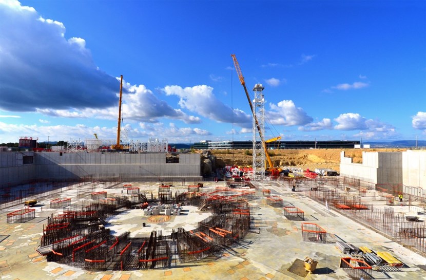 As assembly work was progressing on the two large cranes closest to ITER Headquarters, anchorage for the the central crane (52 metres high) was visible on this picture of the Tokamak Complex basemat slab. Equipped with a 35-metre boom, the central crane will handle loads of up to 9 tonnes. (Click to view larger version...)