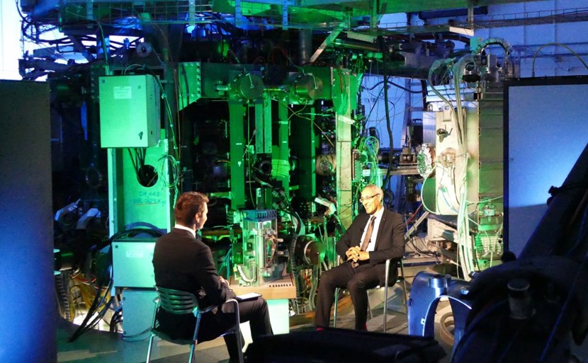 ITER Director-General Bernard Bigot giving an interview to Daniel Stach, moderator of the popular National Czech TV program ''Hyde Park Civilizace'' (which will be aired in English this Saturday) in front of the illuminated Compass tokamak. (Click to view larger version...)