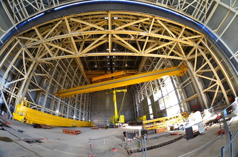 This time, the weight of the auxiliary crane girders and the installation height made it possible to use a telescopic crane that operated from inside the Assembly Hall.<br /><br /> (Click to view larger version...)
