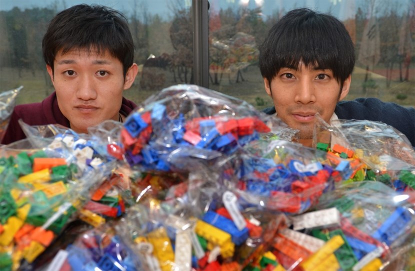 Taishi Sugiyama (left) and Kaishi Sakane from Kyoto University have invested the lobby of ITER Headquarters for one week. Their challenge? To assemble 40,000 Lego bricks into a model of the ITER Tokamak. (Click to view larger version...)