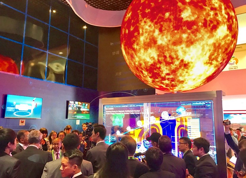 The opening of the Chinese Pavilion drew an enthusiastic crowd eager to learn about fusion. A holographic model of the ITER Tokamak was one of the highlights. (Click to view larger version...)
