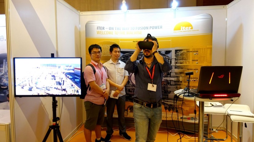 Like you were there! At the ITER stand, these students are trying out the Oculus Rift virtual reality system that makes you feel like you are hovering over the ITER construction site. (Click to view larger version...)