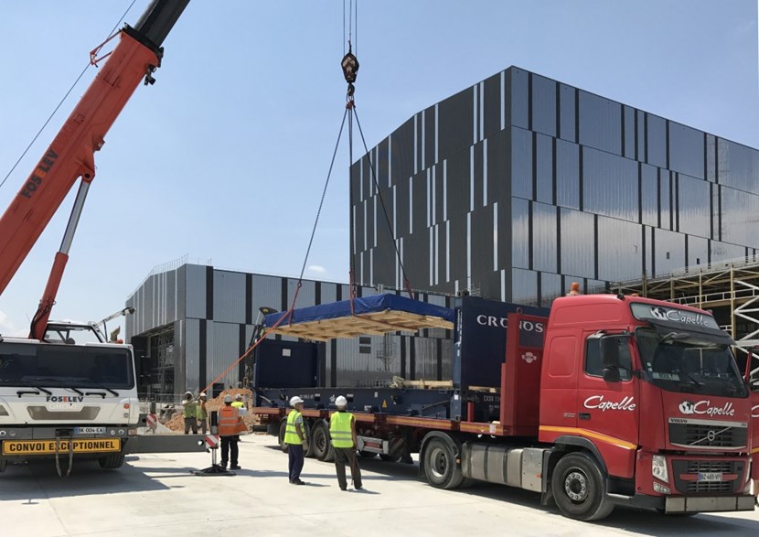 The first components of the sector sub-assembly tool have reached ITER; four more batches are planned in the coming months. The 90 crates of material will be stored in the Cleaning Facility (the smaller building in the photo) until tool assembly begins. (Click to view larger version...)