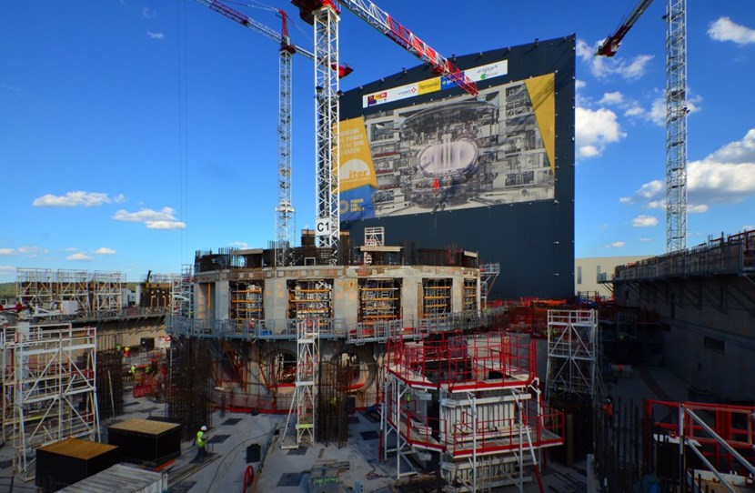 The ITER bioshield, centre, and the Diagnostics Building, right, have both reached L2 level and work is underway on L3. Approximately 400 workers in two shifts are in involved in Tokamak Complex construction. (Click to view larger version...)