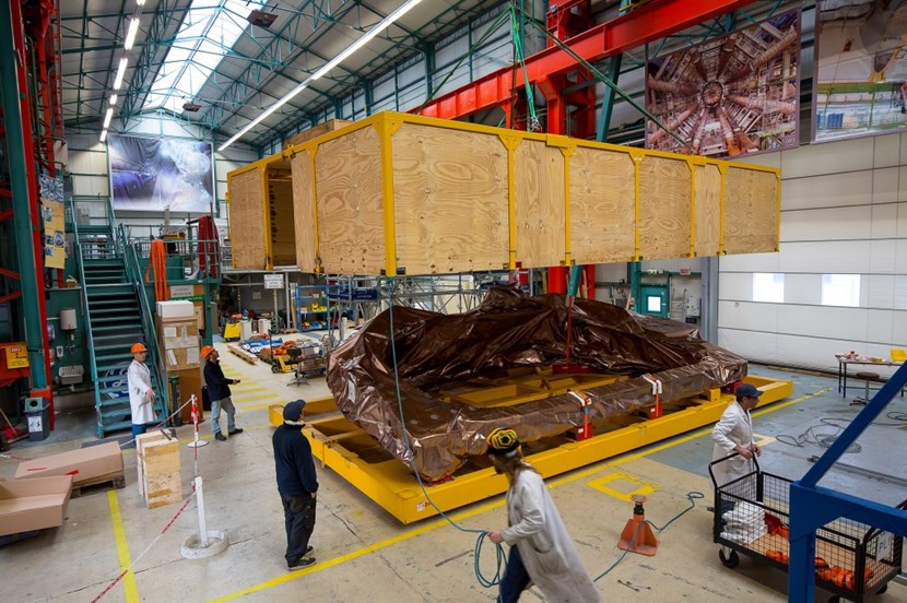 So far 18 toroidal field coils have been successfully cold tested in a dedicated CEA facility at Saclay, close to Paris. A coil is seen here as it is being packed for the trip to Japan. The last two coils of the 18 needed for the tokamak—Isabelle and Jeanne—will be flown to Japan by a giant Antonov cargo plane. © P. Dumas/CEA (Click to view larger version...)