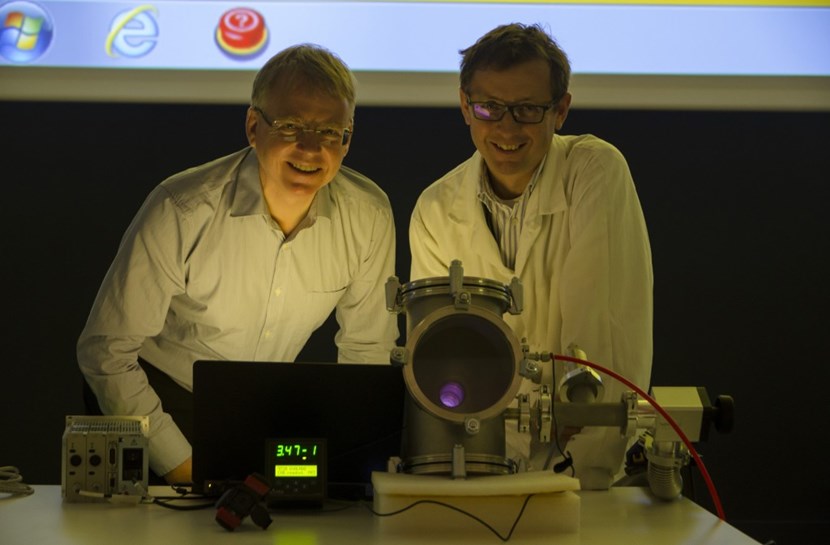 Close to eight years ahead of schedule, ITER's First Plasma was produced last week in the Headquarters amphitheatre ... Pictured here: Vacuum Section leader Robert Pearce (left) and Silvio Giors. (Click to view larger version...)