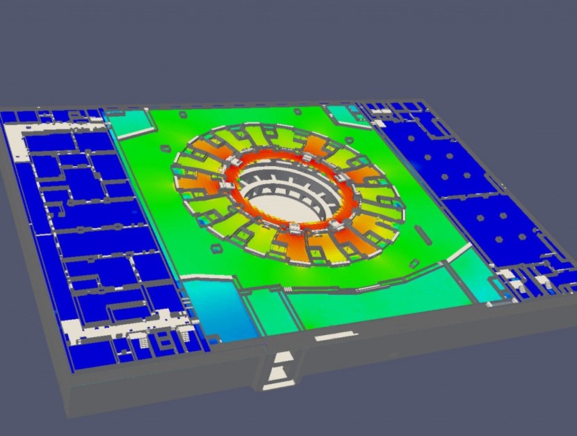 A simulation of neutron flux inside the Tokamak Building. (The white area at the centre is occupied by the machine.) The drawing clearly shows the obstacles that stand in the way of the exiting neutrons: the bioshield that closely encircles the machine; the outer boundary of the port cells (in white), and the external walls. Beyond the walls, only ''a handful'' of neutrons will survive—undistinguishable by then from the natural background ''noise.'' (Click to view larger version...)