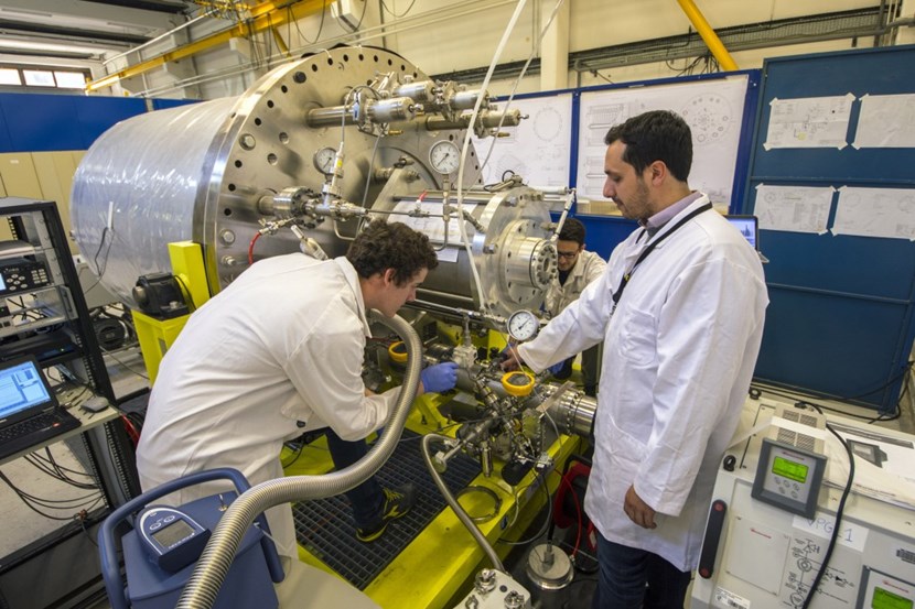 ''No one has ever built a cryopump comparable to this one,'' says ITER vacuum engineer Roberto Salemme (right). The 3.4-metre-long, 8-tonne component is being tested in a laboratory that the ITER vacuum team has set up in the neighbouring CEA-Cadarache. (Click to view larger version...)