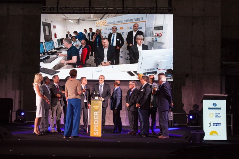 ITER Director-General Bernard Bigot did the honours of switching on the world's largest negative ion source, while the audience could track the event on the screen. In the coming months, the team will begin extracting negative ions. (Click to view larger version...)