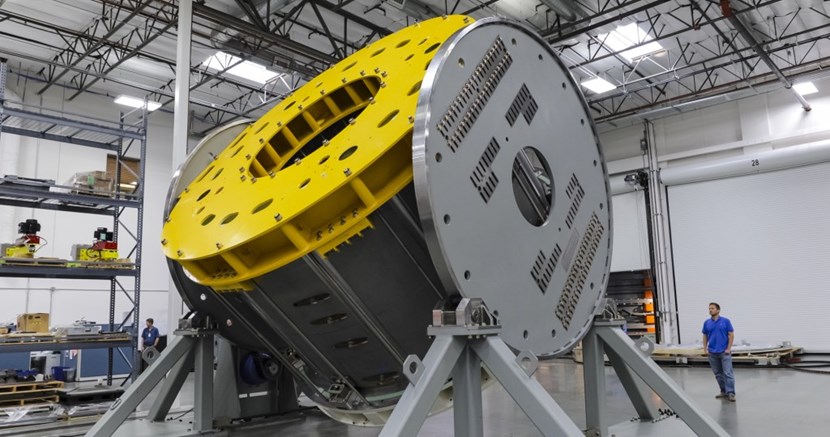 Before a 110-tonne module can be completed, it must be turned over by a specialized handling tool. US ITER contractor General Atomics is fabricating seven modules for the central solenoid (six plus one spare). Photo: GA (Click to view larger version...)