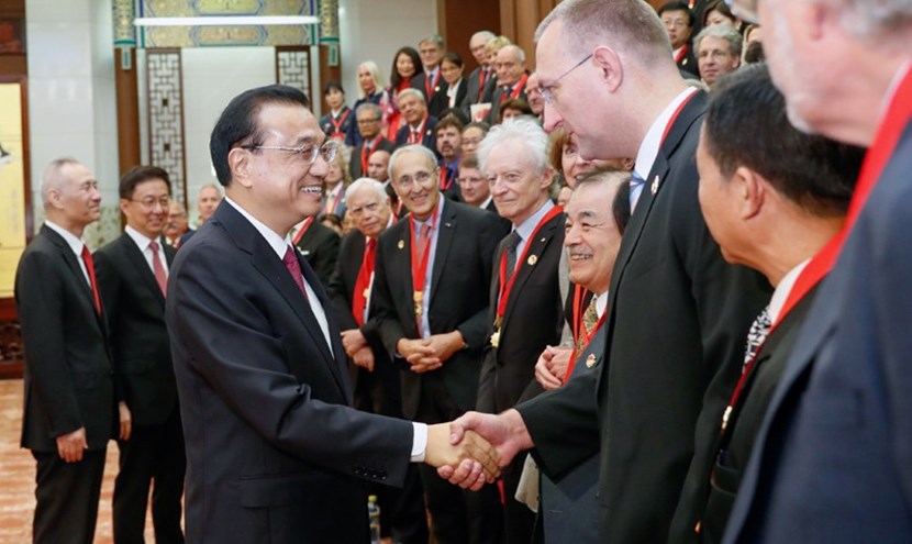 Premier Li congratulates each of the winners individually. (Bernard Bigot stands in the very centre of the image.) (Click to view larger version...)