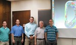 Standing in front of a neutronics model of ITER: (left to right) Ed Marriott, Tim Bohm, Paul Wilson, Mohamed Sawan and Ahmad Ibrahim, US ITER researchers at the University of Wisconsin. 