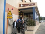 Alexis Dammann, Virginie Beaudoin, Victor Ivanov (CCS),  Andrew Gray and Atsushi Onozawa (visiting researcher) stand at the entrance of the Atalante facility in CEA-Marcoule, some 30 kilometres northeast of Avignon.
