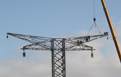 The spectacular aerial ballet will continue in the coming weeks as 12 identical pylons are erected and assembled along the six kilometres that separate the ITER platform from the 400 kV power line. (Click to view larger version...)