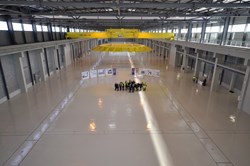 The huge PF Coils workshop won't remain empty very long. As early as this summer, the installation will be fitted out with the necessary tools and equipment in order to begin the fabrication of ITER largest coils. (Click to view larger version...)