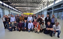 Participants to the site acceptance test event that was held on 2 October in the vast PF Coils Building (Click to view larger version...)