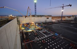 As the sun comes up over the ITER site on 11 December, the first pouring operations are already underway. Twelve hours were necessary to fill the 550 m² segment, the first of 15 segments that will make up the Tokamak Complex basemat. (Click to view larger version...)