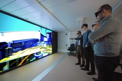 The visualization software enables the design engineers to literally ''walk through'' the ITER machine and the surrounding Tokamak Complex. (Click to view larger version...)